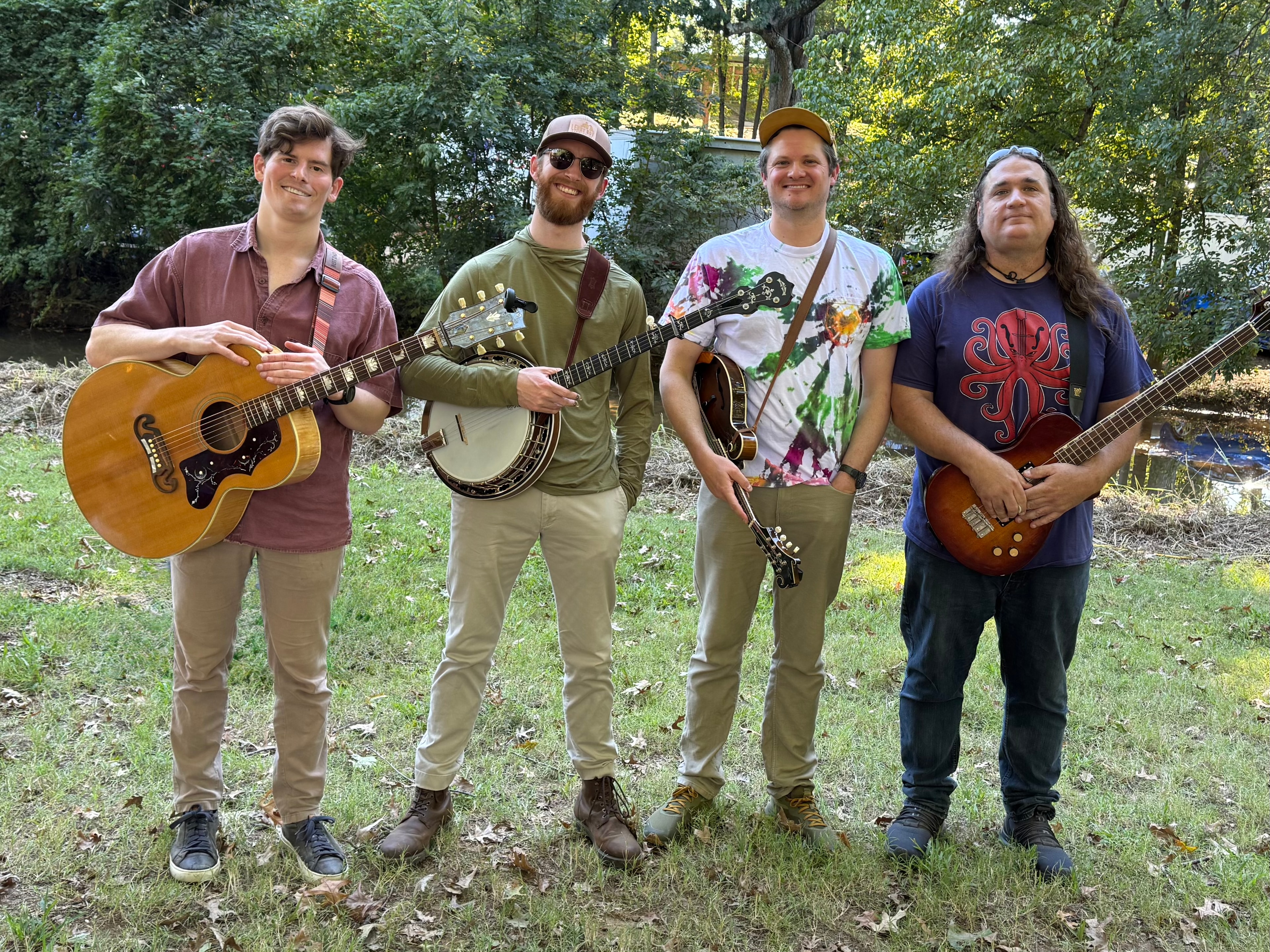 The Side Jam band members with instruments outdoors